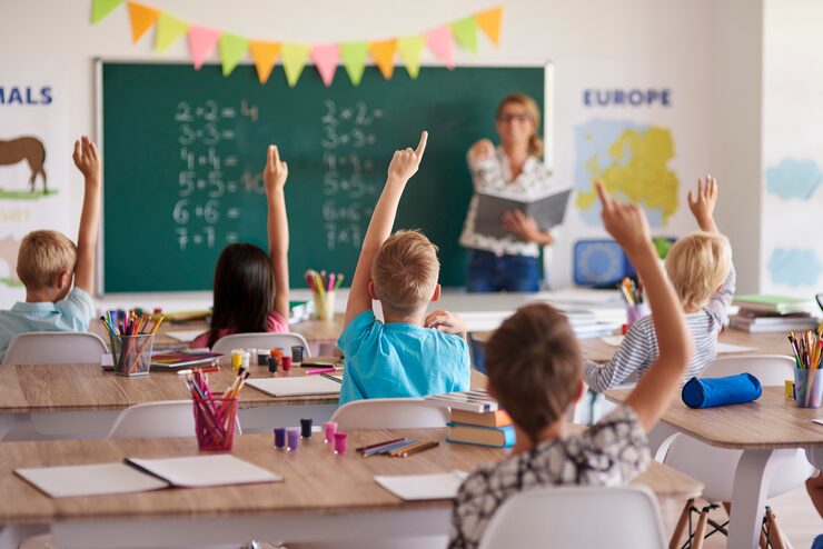 Classroom of children, representing schools planned in Dholera